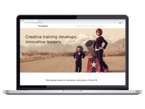 website design view on macbook human cannonball training page for Formation creative work website design and marketing