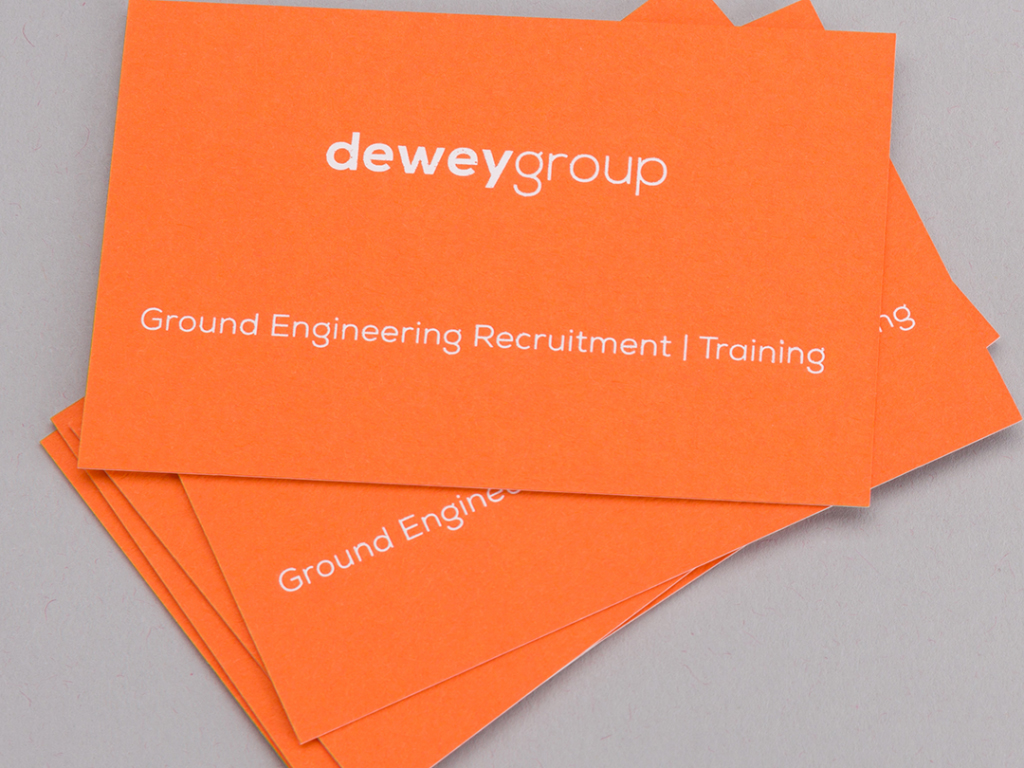 Dewey Group orange business cards creative work branding