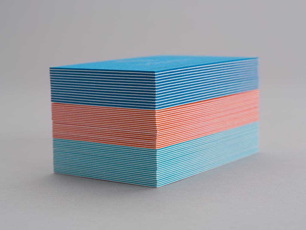 octopus business card stack of coloured triplex layers creative work