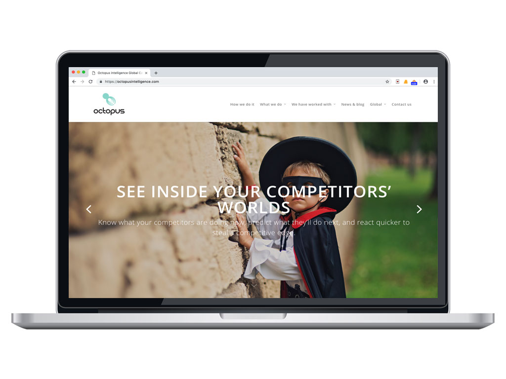 website design view on macbook zoro competitive intelligence page for Octopus Intelligence creative work website design and marketing