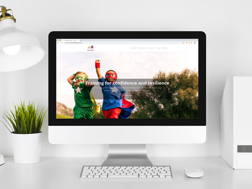 website design view on Imac super heros confidence training page for Ultimate Resilience creative work website design and marketing